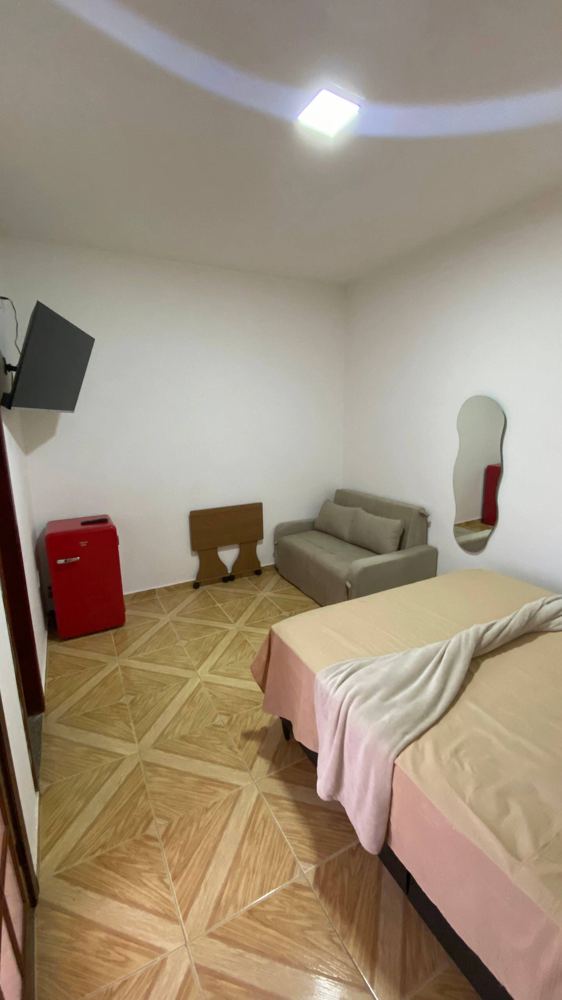 Suíte Maresias com cama queen e sofá-cama
